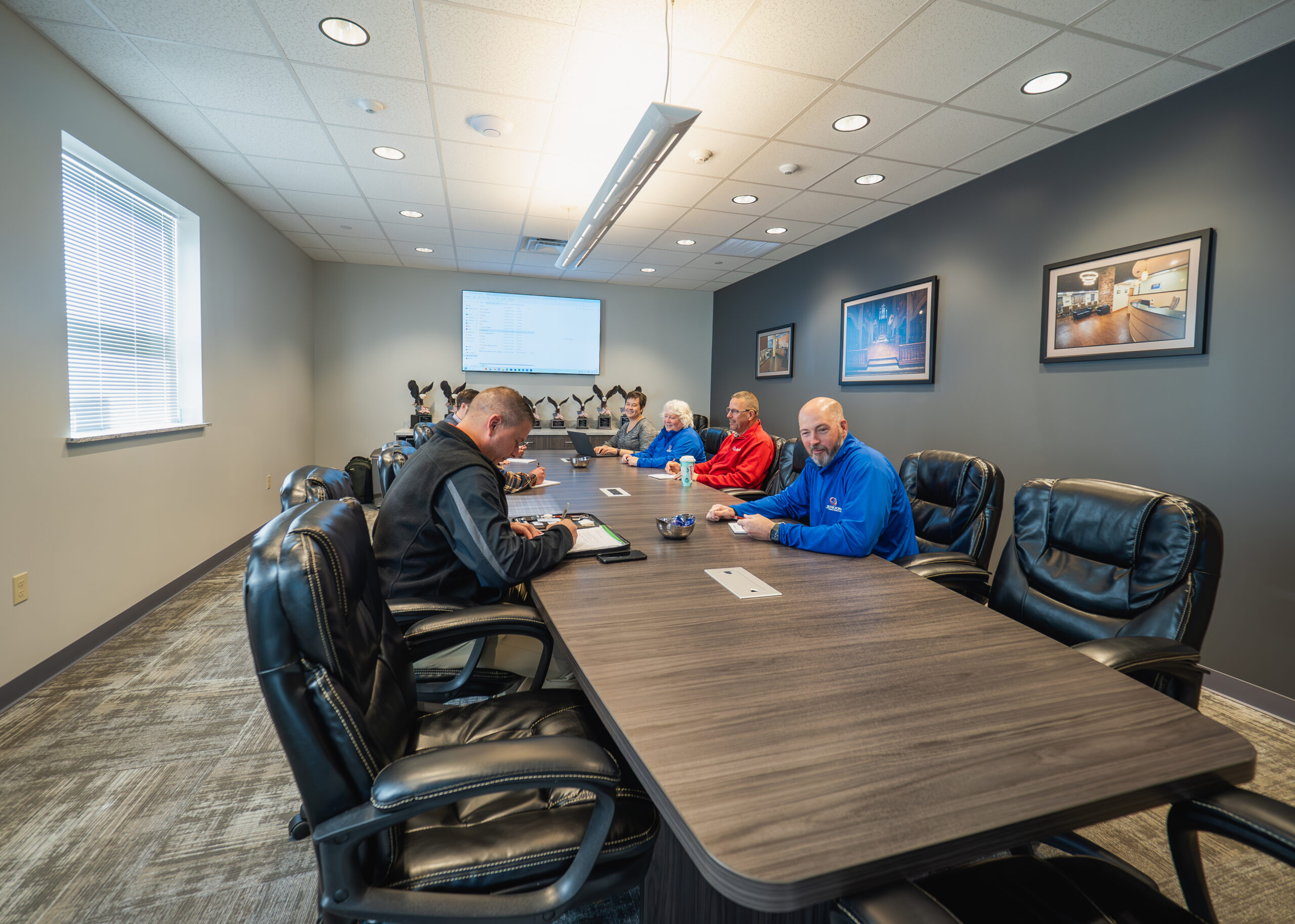 Construction team sitting around a table